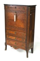 A 19th century marquetry inlaid fall front secretaire with ormolu decoration.