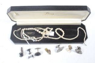 A cultured pearl single row necklace and other items.