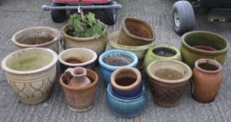 A collection of assorted garden plant pots. Max.