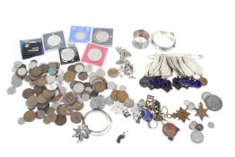 A collection of silver jewellery including a broad hinged bangle,