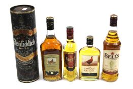 Five bottles of Scotch Whisky. Comprising Glennfiddich, two Famous Grouse, Grants and Bell's.