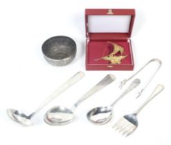 A collection of foreign white metal and silver-plated items.
