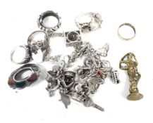 Seven silver and white metal dress rings and other items including a knot ring.