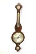 A vintage aneroid 'banjo' barometer. Marked J Croce, York.
