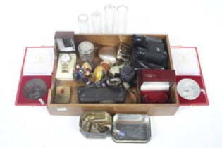 A box of miscellaneous collectables including watches, medals, lighters,