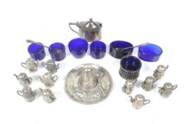 A collection of silver and plated small collectables including a silver oval mustard pot.