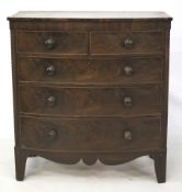 A bow front Victorian chest of drawers. Two short over three graduated long.