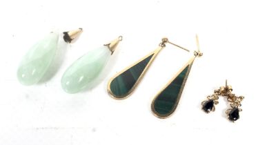 Three pairs of pendent earrings.