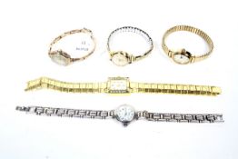 A collection of lady's wrist and bracelet watches including an Uno 9ct gold tonneau-shaped wrist