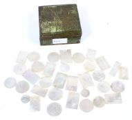 A vintage box of 19th century and later Chinese carved mother of pearl antique chips or gaming
