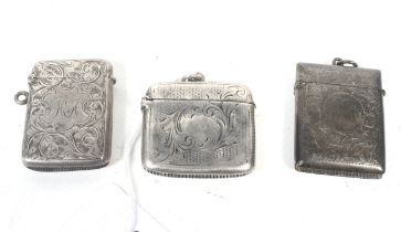 Three Victorian and later silver vesta or match cases.