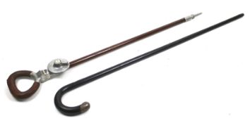 An ebonised silver mounted walking cane and a shooting stick. Max.