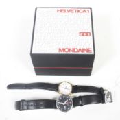 Mondaine, a Swiss stainless steel round wrist watch.