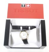 Tissot, a gentleman's gold-plated and stainless steel round wrist watch, ref; T870/970. No.
