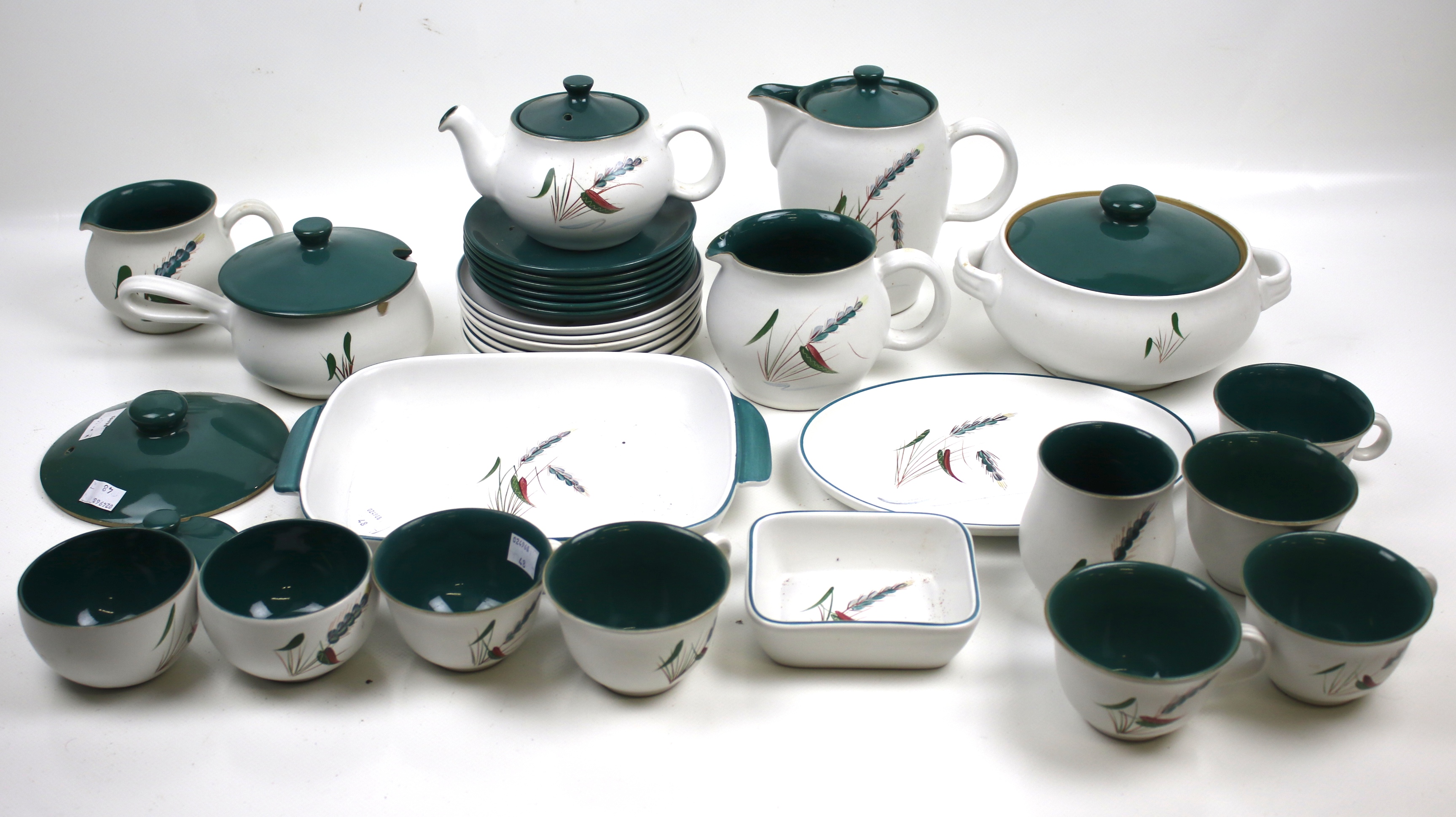 A Denby Pottery tea and dinner service in the 'Greenwheat' pattern.