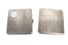 Two silver engine turned square cigarette cases.