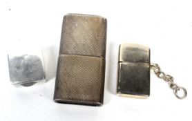 A 'Howitt' silver mounted two-piece pocket cigarette lighter and other items.