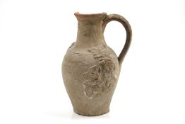 A 19th century sailor jug. Marked 'June 22 1885', decorated with an angel and vines, H15.