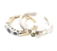 A vintage 9ct gold, sapphire and diamond ring and a silver and peridot ring.