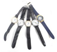 A collection of 5 vintage mens watches on leather straps