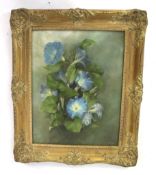 A 20th century oil on board floral still life.