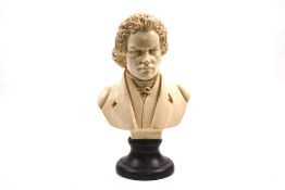 A contemporary bust of Beethoven. On a circular pediment, H22.