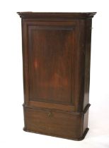 A wall mounted mahogany hall cupboard.