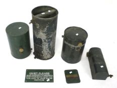 A collection of assorted vintage fuel and water tanks.