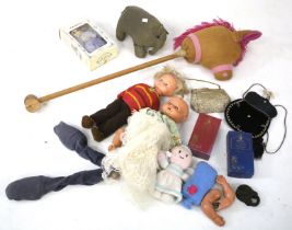 A brown linen hobby horse and other soft toys.