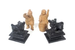 Two carved and signed Chinese figures and a pair of slate Temple dogs Condition Report: