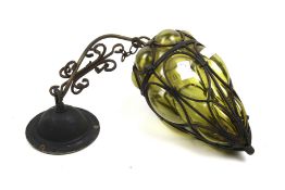 A mid-century Murano style caged green bubble glass light pendant.