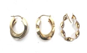 A pair of Italian 9ct gold, satinised and polished hoop earrings.