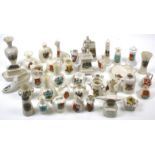 An assortment of Goss and crested ceramics. Including vases, ornaments, etc. Max.