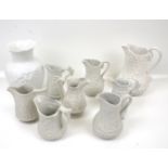 A collection of Parian ware. Including a Kaiser vase, Portmeirion jugs, etc.