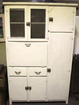 An early 20th century kitchen cupboard.