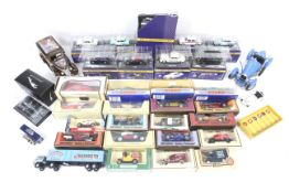 A collection of diecast cars. Including Corgi, Lledo and Burago etc.