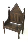 A Victorian oak 'Gothic' style throne.