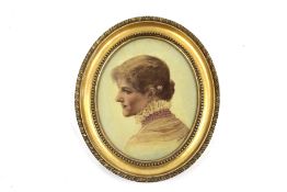 A small portrait of a woman in an oval gilt frame. Signed and dated Walter Seymour 1878.