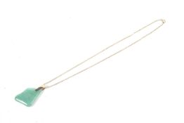 A mid 20th century gold and green chalcedony pendant, on a gold chain.