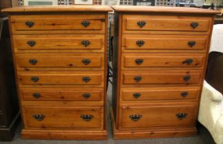 A pair of Younger Furniture chests of drawers. Each with five shallow over one deep drawer.