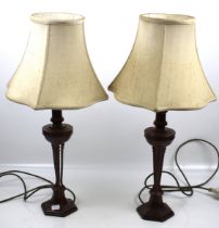 A pair of contemporary Rochamp Ltd table lamps. With cast metal bases.