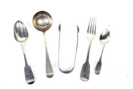 A collection of George III and later silver flatware.
