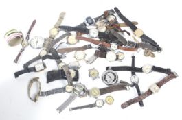 A large collection of miscellaneous lady's and gentleman's wrist and bracelet watches.