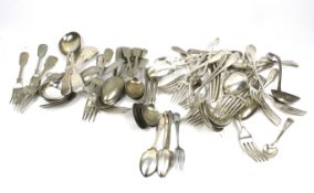 A collection of silver-plated flatware.