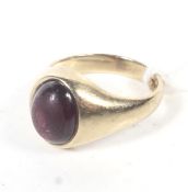 A vintage 9ct gold and garnet single stone ring.