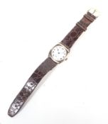An early 20th century wristwatch in a later 9ct rose gold cushion-shaped case circa 1940.