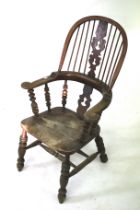 A Victorian low Windsor chair.