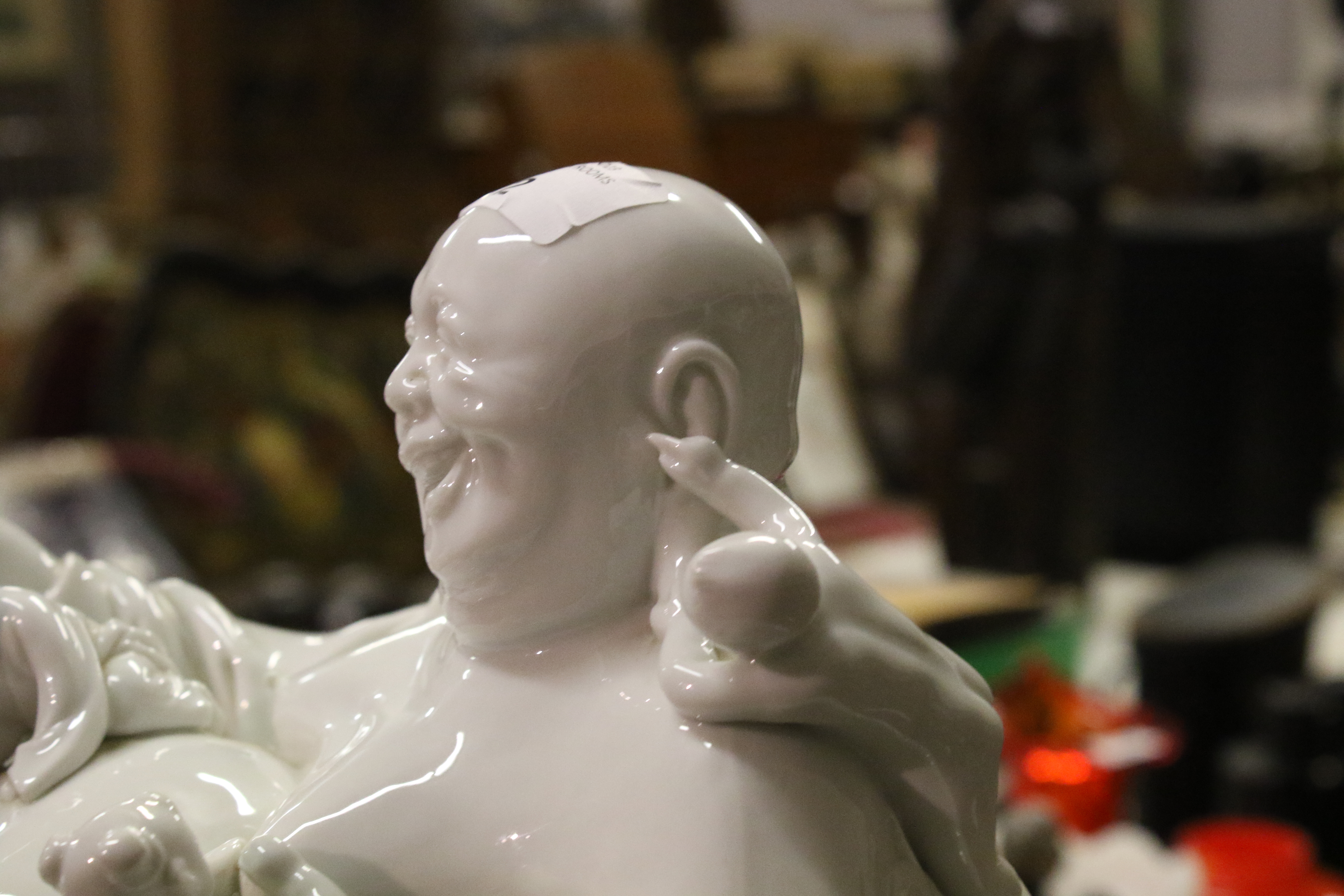 A 20th century Chinese Blanc de Chine figure of laughing Buddha with five children. - Image 14 of 17
