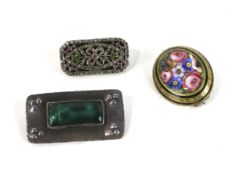A group of three early 20th century brooches,