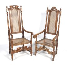 Two similar Victorian high back armchairs.